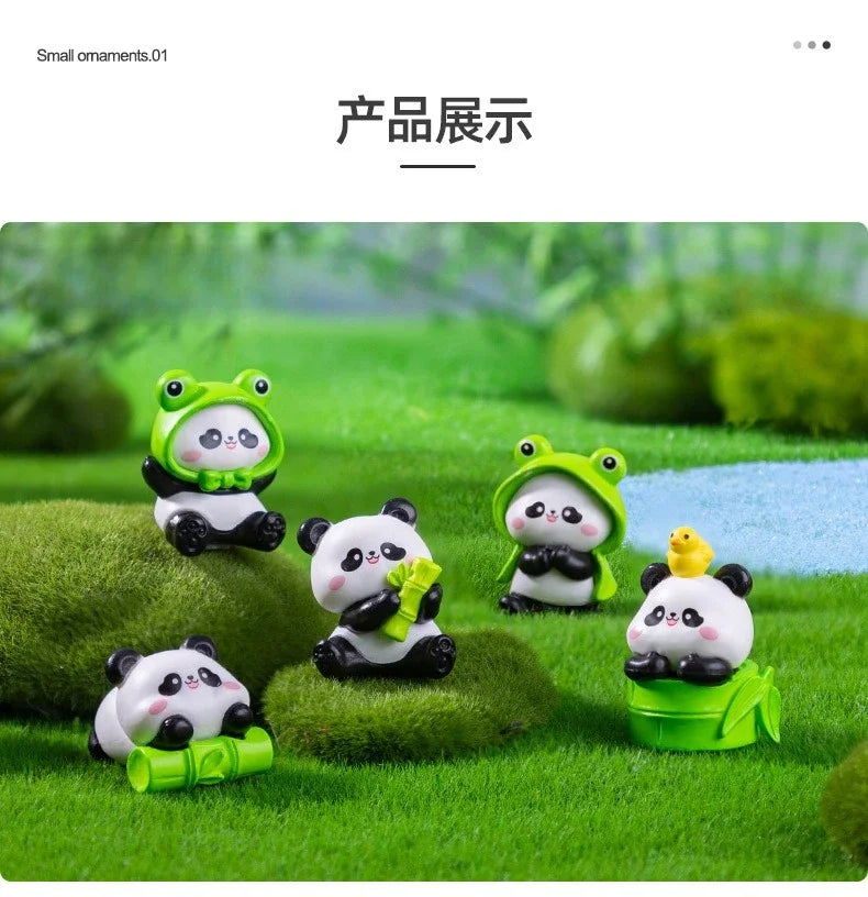 A set of adorable resin panda figurines in various green and white colors displayed on a bright green lawn.