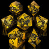 A set of gold metal dice featuring dragon designs and numbers, arranged in various angles.