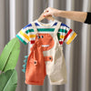 A child-sized dinosaur outfit set featuring an orange dinosaur-shaped romper and a striped shirt.
