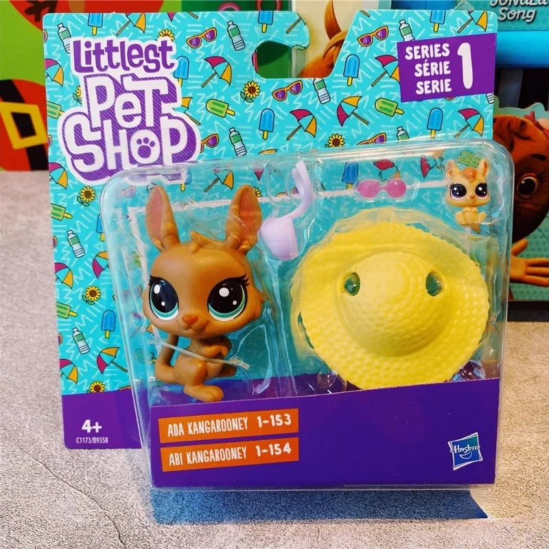 A set of three Little Pet Shop figures, including Ada Kangaroo and Abi Kangaroo, packaged in a clear plastic case.
