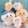 A collection of Chiikawa plush dolls featuring characters like Hachiware and Usagi in various pastel colors.