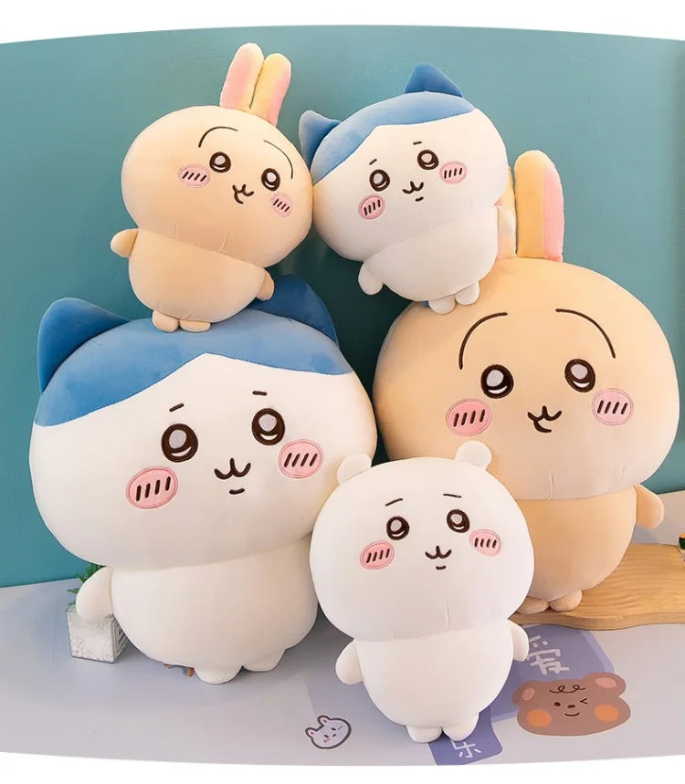 A collection of Chiikawa plush dolls featuring characters like Hachiware and Usagi in various pastel colors.