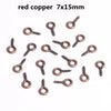 A collection of red copper eye pins with screw threads for jewelry making.