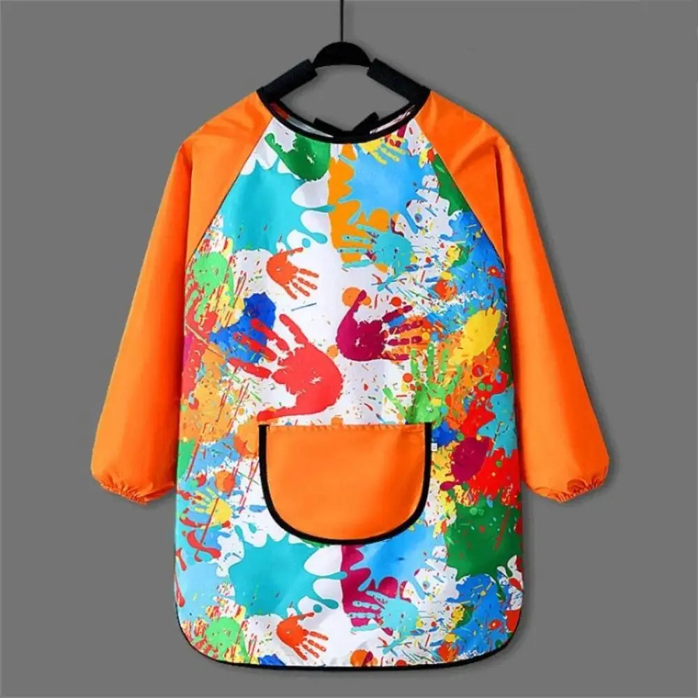 Kids waterproof long-sleeve art smock and dining bib featuring a colorful paint splatter design