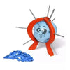 An orange plastic game with metal spikes and a blue face cutout, along with a blue balloon piece.