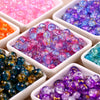 Assortment of gradient crystal glass beads with golden crackle finish in various colors and shades