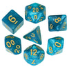 A set of seven blue marble effect polyhedral dice showing various numbers and angles.