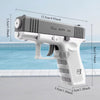 A white tactical water blaster pistol is shown from the side, with dimensions and scale references.