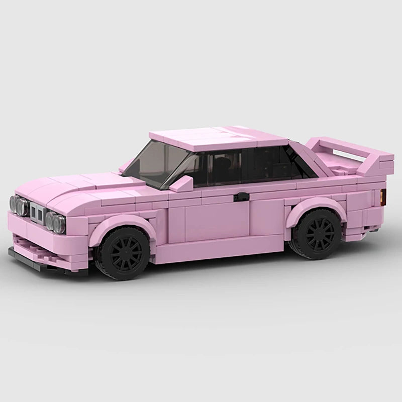 A pink classic rally car model built from LEGO-style building blocks.