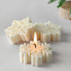 White snowflake silicone mold used for making candles, soap, and wax melts