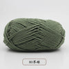 A ball of olive green pre-dyed milk cotton yarn, 80 strands thick, shown from the side.
