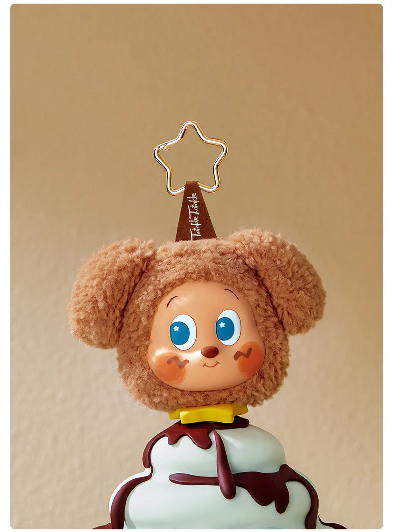 A cute, fluffy brown bear-like character with large blue eyes is shown wearing a golden star earbud case cover.