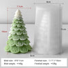 A silicone mold for a Christmas tree candle featuring star and snowflake details, shown next to the finished product.