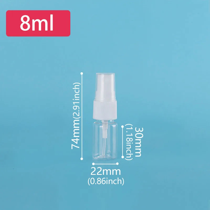 A clear glass spray bottle with a white pump dispenser is shown against a light blue background.