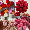 A collection of realistic pink and red rose silicone molds for candle, soap, and crafting.