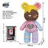 A set of bear brick building blocks featuring a half anatomy fluid art design in pink and yellow colors.