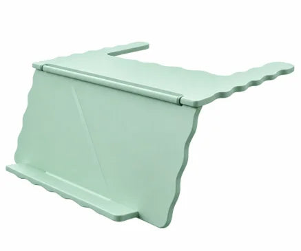 A light green foldable mahjong card holder with a non-slip stand.