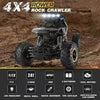 A black 4x4 rower rock crawler model featuring LED headlights and various off-road accessories.