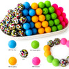 A collection of colorful silicone beads in various shades including blue, yellow, green, and pink.