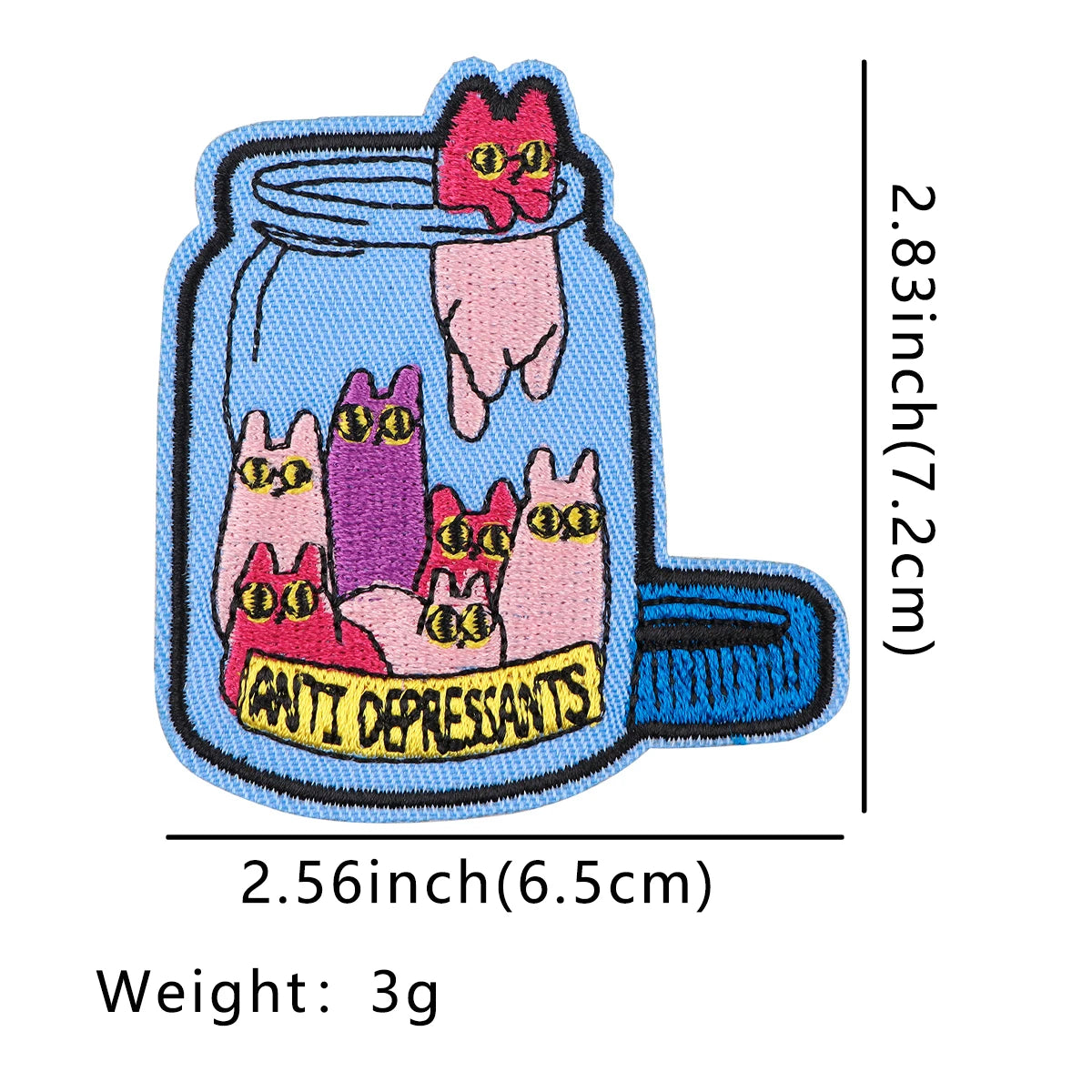 A light blue glass jar filled with three pink and purple cat-shaped embroidered patches.