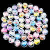 A collection of 32mm surprise capsule egg toys featuring mixed animal and cartoon figures in various colors for party favors.