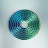 A circular, iridescent spinner ring with concentric grooves in shades of blue and green.