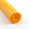 A roll of bright orange crepe paper for DIY crafts and gift wrapping.