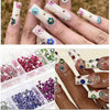 Hands display various multi-size flat back acrylic rhinestones used for nail art and DIY crafts