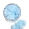 A clear jar filled with light blue adhesive flocking powder for jewelry making and crafts.