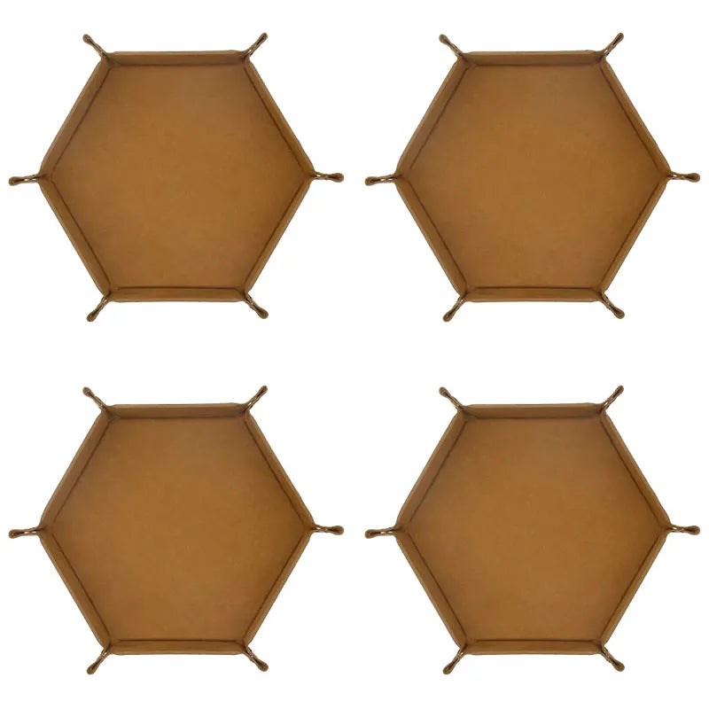A set of four foldable PU leather hexagonal dice trays for tabletop games and desk organization.
