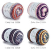 Four different spools of gradient rainbow cotton-wool yarn for knitting and crochet
