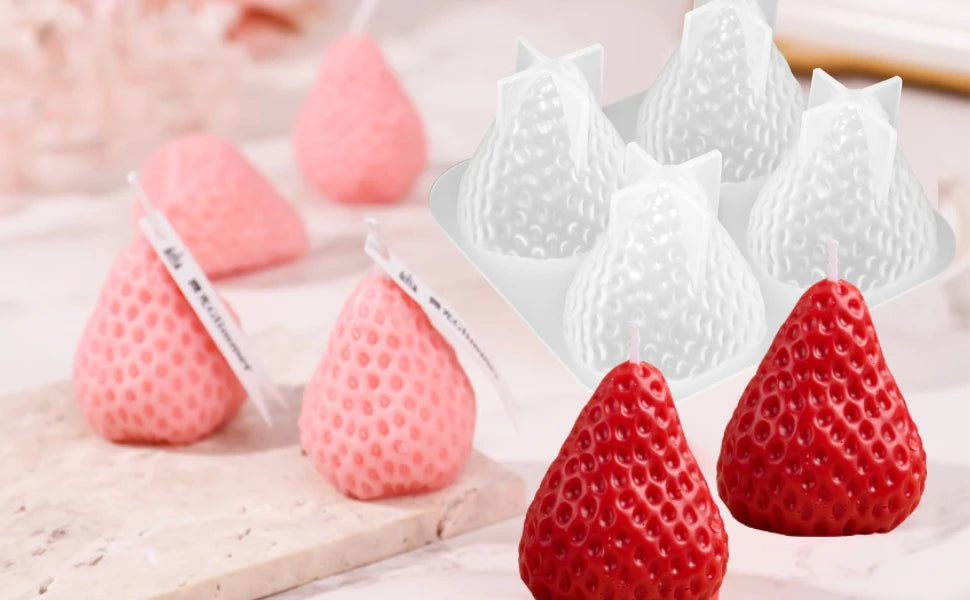 Pink and red silicone strawberry molds for crafting projects like candles, soap, fondant, and epoxy resin