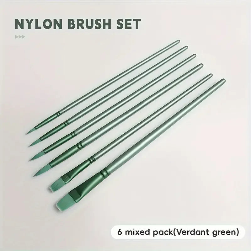 A set of six mixed green nylon paint brushes laid diagonally on a white background.