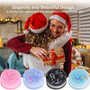 A collection of colorful squishy stress relief toys including pink, blue, black, and light blue versions.