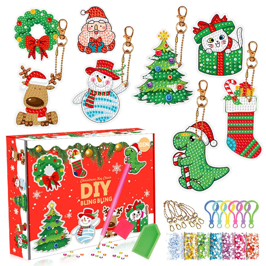 A craft kit for making a 5D diamond painting keychain with various charms and pendants.