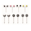 A set of ten white mini fruit forks with various cute face designs for kids