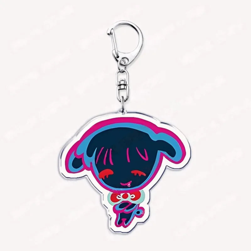 Acrylic keychain featuring a cute chibi character with dark hair and blue accents.