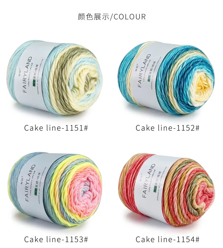 Rolls of gradient rainbow cotton-wool yarn in various shades for knitting and crochet projects