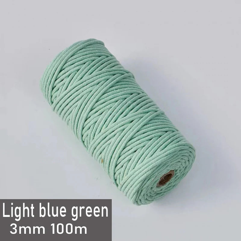Spool of light blue green 3mm cotton macrame cord measuring 100 meters