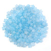 A pile of light blue transparent star acrylic beads for jewelry making