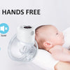 A woman is using a hands-free electric breast pump for her baby, demonstrating its features.