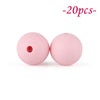 Two pink silicone beads are shown against a white background, indicating a set of soft beads for jewelry making.