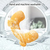 A yellow plush U-shaped pet pillow being washed in water, demonstrating hand and machine washability.
