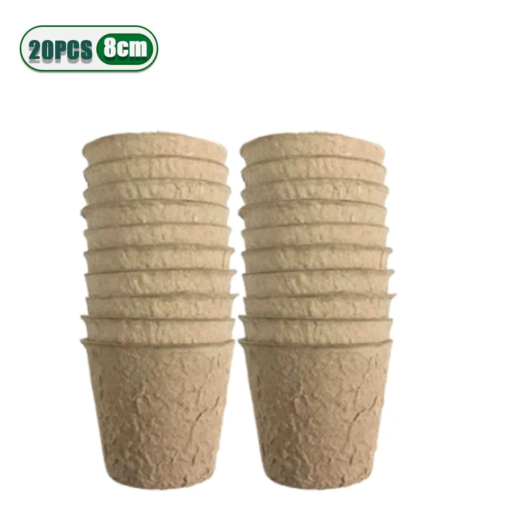 A pair of light brown biodegradable peat pots for seed starting, stacked vertically.