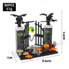 A black haunted house building block set featuring spooky figures and gates for DIY Halloween decor.