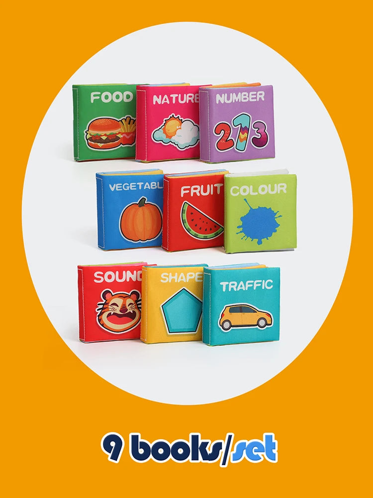A set of nine colorful cloth books featuring various concepts like food, nature, number, and shape.