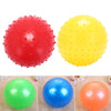Three inflatable sensory balls in red, yellow, blue, and orange for kids