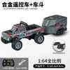 A black and red 1:64 scale alloy remote control monster truck with a car body and trailer.