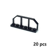 A set of twenty black motor and servo pieces for building blocks.