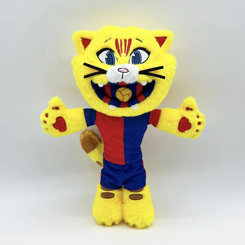 A yellow and orange cat mascot plush toy with blue accents and a football emblem.
